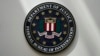 FILE - An FBI seal is displayed on a wall in Omaha, Nebraska, Aug. 10, 2022.