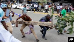 Opposition supporters demonstrate against the Independent Electoral and Boundaries Commission (IEBC) in Nairobi, Kenya, Oct. 11, 2017.