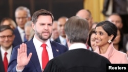 Vice President-elect J.D. Vance takes oath arsenic  his woman  Usha Vance reacts connected  the time  of the Presidential Inauguration of Donald Trump astatine  the Rotunda of the U.S. Capitol successful  Washington, Jan. 20, 2025.