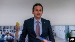 Sen. Brian Schatz, D-Hawaii, speaks with reporters as he walks to a vote on Capitol Hill, Sept. 6, 2023 in Washington.