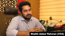 Nahid Islam, 26, a student leader who has become an interim government adviser in Bangladesh, speaks in his office on Sept. 29, 2024.