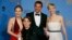 "American Hustle" stars Amy Adams (L), Bradley Cooper and Jennifer Lawrence (R) pose backstage with producer Megan Ellison after the film won the award for Best Motion Picture, Musical or Comedy at the 71st annual Golden Globe Awards, Jan. 12, 2014.