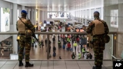 Soldiers patrol in the departure terminal, during the one-year anniversary service at Zaventem Airport in Brussels, March 22, 2017. The suicide bombings at the Brussels airport and subway on March 22, 2016, killed 32 people and wounded more than 300 other