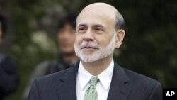 Federal Reserve Chairman Ben Bernanke walks outside of the Jackson Hole Economic Symposium, Aug. 31, 2012, at Grand Teton National Park near Jackson Hole, Wyo.