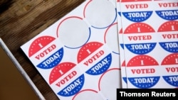 FILE - Voters cast ballots in the Democratic primary in Philadelphia, Pennsylvania, June 2, 2020.
