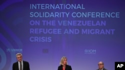 EU Foreign Policy chief Federica Mogherini talks to journalists during a joint news conference with UN High Commissioner for Refugees Filipo Grandi and UN Migration Agency Director-General Antonio Vitorino in Brussels, Oct, 29, 2019.