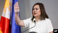 FILE - Philippine Vice President Sara Duterte gestures as she speaks during a press conference in Manila, Philippines, Feb. 7, 2025.