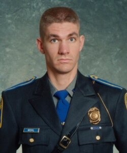 This undated photo provided by the Connecticut State Police shows Sgt. Brian Mohl, a 26-year veteran of their Woodbury department. Mohl called for help about 3:30 a.m., Sept. 2, 2021.