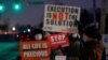 FILE - Activists protest the death penalty at the United States Penitentiary in Terre Haute, Indiana, Jan. 12, 2021.