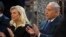 FILE - Israeli Prime Minister Benjamin Netanyahu, right, and his wife, Sara Netanyahu, applaud during their visit to a synagogue in Vilnius, Lithuania, Aug. 26, 2018.