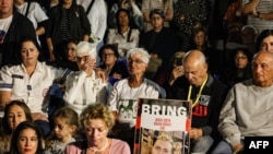 Relatives, friends and supporters of Elkana Bohbot (34) held hostage in Gaza since the October 7 attack by Hamas militants in southern Israel, take part in a protest to ask for the release of Israeli hostages in Tel Aviv on November 22, 2023.