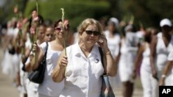 Damas de Blanco rindieron tributo en La Habana a su líder fallecida Laura Pollán. 