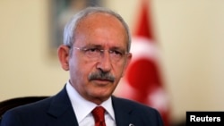 FILE - Kemal Kilicdaroglu, who heads Turkey's main opposition Republican People's Party (CHP), sounds skeptical that a ruling coalition will form. 