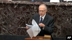 Alan Dershowitz, an attorney for President Donald Trump, speaks during the Trump's impeachment trial in the Senate at the Capitol in Washington, Jan. 27, 2020.