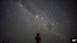 FILE - A U.S. Army soldier assigned to Site Security Team Task Force Guardian, is seen at an unidentified location in Somalia, June 10, 2020.