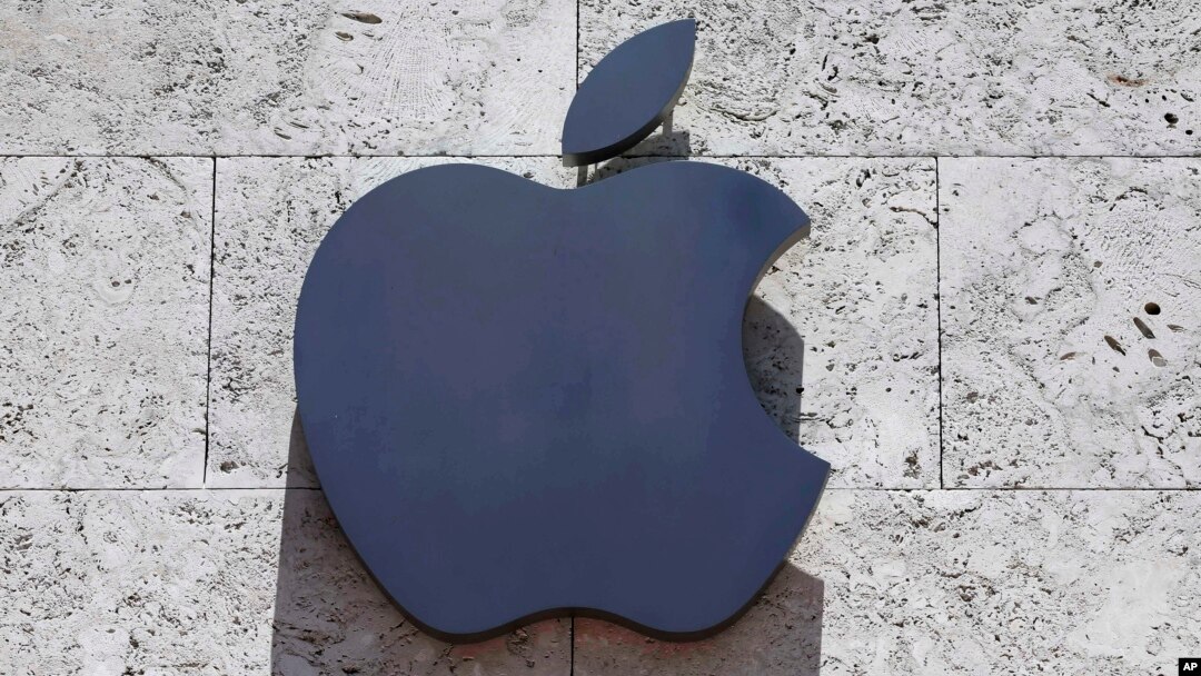 FILE - The Apple logo is seen at a store in Miami Beach, Florida, Aug. 8, 2017. 