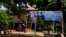 Party logo of Cambodia People’s Party located in front of deputy Kandal Krom village chief in the Khmer Rouge area of Anlong Veng district (Sun Narin/VOA Khmer)