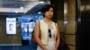 Selina Cheng, the newly elected chair of the Hong Kong Journalists Association, leaves office after her employment contract with the Wall Street Journal was terminated, in Hong Kong on July 17, 2024.