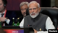 FILE - Indian Prime Minister Narendra Modi speaks during the G20 leaders summit in Nusa Dua, Bali, Indonesia, Nov. 15, 2022.