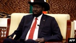 South Sudanese President Salva Kiir (pictured) meets his Sudanese counterpart, Omar al-Bashir, in Khartoum on Sept. 21, 2018. 