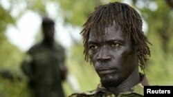 Achellam en unha fotografía tomada en 2006 en el sur de Sudán, es considerado uno de los cinco líderes más importantes del LRA.