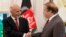 Pakistan's Prime Minister Nawaz Sharif, right, receives Afghan President Ashraf Ghani at the prime minister house in Islamabad, Pakistan, Saturday, Nov. 15, 2014.
