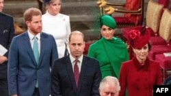 FILE - Britain's Prince Harry (L) and Meghan (2nd R) follow Prince William (C), and Catherine (R) as they depart Westminster Abbey after attending the annual Commonwealth Service in London, March 9, 2020.