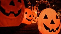 A home is decorated with pumpkins and ghosts for Halloween, in Burbank, California, Oct. 30, 2021.