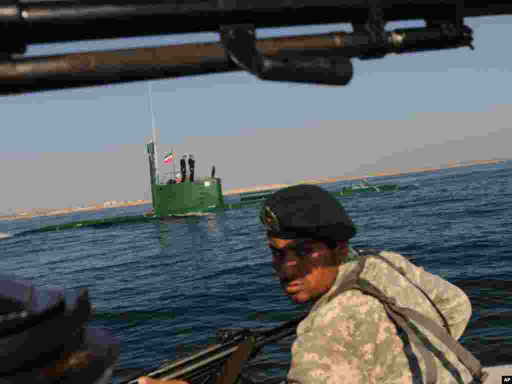 Members of the Iranian Navy participate in a drill on December 28, 2011 in the Sea of Oman. (AP)