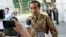New Indonesian President Joko Widodo, center, talks to the media at Merdeka Palace in Jakarta, Indonesia, Oct. 21, 2014.
