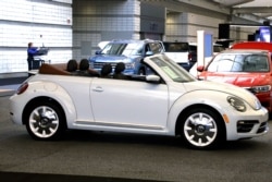FILE - A 2019 Volkswagen Beetle convertible is on display at the 2019 Pittsburgh International Auto Show in Pittsburgh, Feb. 14, 2019.
