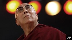 Tibet's exiled spiritual leader the Dalai Lama attends a conference called "Living Together with Responsibility and Cooperation" in Sao Paulo September 17, 2011.