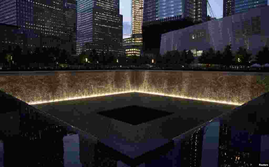 The south reflecting pool of the 9/11 Memorial Plaza is seen on the tenth anniversary of the completion of the initial cleanup efforts at ground zero in New York, May 30, 2012. REUTERS/Andrew Burton 