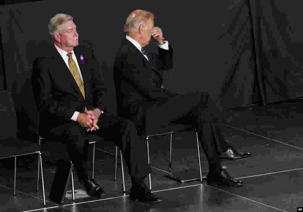 Vice President Joe Biden rubs his eyes during the &quot;Our Fallen Brothers&quot; memorial service for the 19 fallen firefighters at Tim&#39;s Toyota Center in Prescott Valley, Arizona, July 9, 2013.&nbsp;