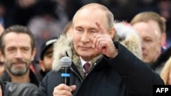 Le président Vladimir Poutine, en campagne pour la prochaine présidentielle, au stade Luzhniki, Moscou, 3 mars 2018.