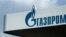FILE - The logo of Russia's energy giant Gazprom is pictured at one of its gasoline stations in Moscow, April 16, 2021.
