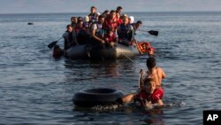 Imigranti iz Sirije i Avganistana kod grčkog ostrva Lezbos, 27. jul 2015.