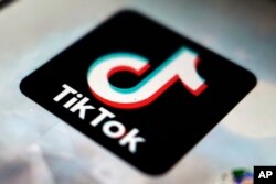 FILE - TikTok app logo, in Tokyo, Japan, September 28, 2020. The EU ratcheted up its scrutiny of Big Tech companies on October 19, 2023, with demands for Meta and TikTok to detail their efforts on curbing illegal content and disinformation amid the Israel-Hamas war.