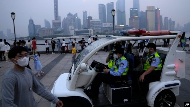 Hackers claim to have obtained a trove of data on 1 billion Chinese from a Shanghai police database in a leak that, if confirmed, could be one of the largest data breaches in history. (AP Photo/Ng Han Guan)