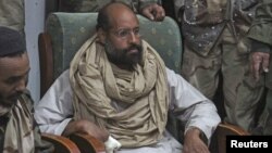 Saif al-Islam Kadhafi lors de sa capture en Libye le 19 novembre 2011.