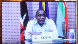 Kenyan President Uhuru Kenyatta appears on a screen as he speaks during a virtual bilateral meeting with Secretary of State Antony Blinken at the State Department in Washington, April 27, 2021.