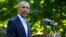 President Barack Obama speaks about developments in Iraq from Chilmark, Massachusetts, during his family vacation on the island of Martha's Vineyard, Aug. 11, 2014. 