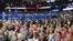 Delegates on the floor watching speakers at the Republican National Convention, Tampa, Florida, August 28, 2012. (J. Featherly/VOA)