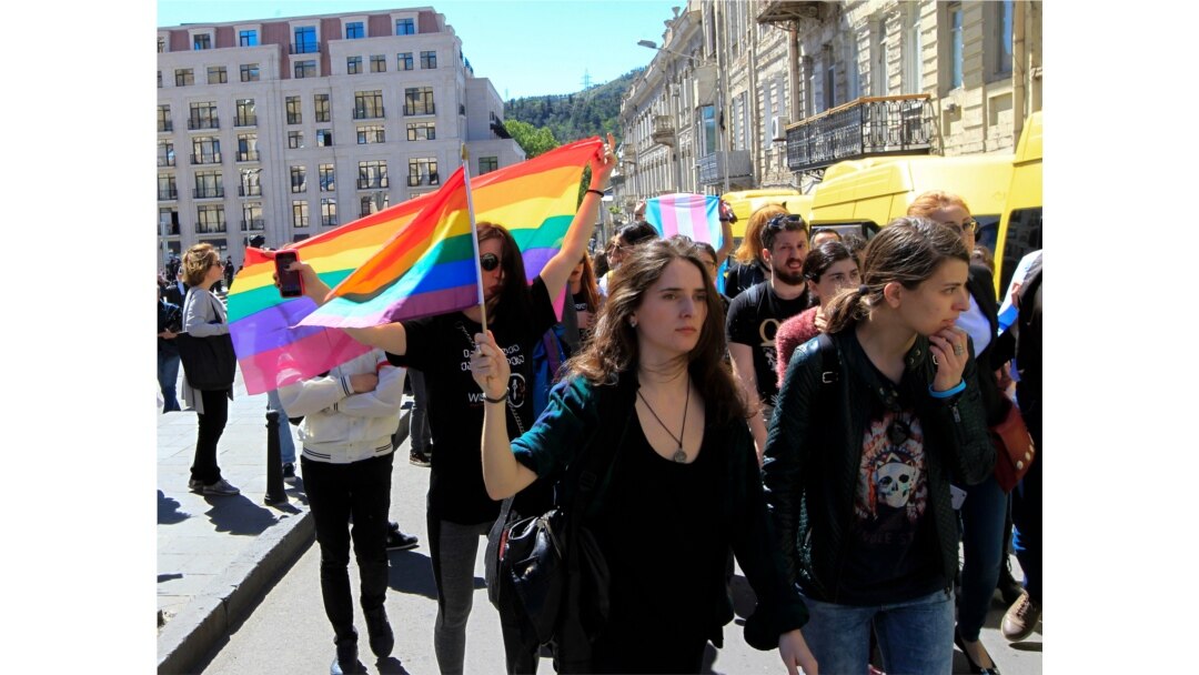 Georgian LGBT activists attend a rally against homophobia outside the State Chancellery to mark international day against homophobia.