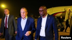 FILE: Russian Foreign Minister Sergei Lavrov is welcomed by his Malian counterpart Abdoulaye Diop as he arrives for a two-day visit in Bamako, Mali February 7, 2023