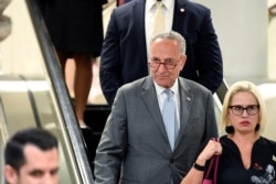 Senate Minority Leader Chuck Schumer of New York heads to a briefing on election security on Capitol Hill in Washington, July 10, 2019.