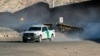 A U.S. Border Patrol truck rides along the border wall in Sunland Park, New Mexico, Jan. 20, 2025.