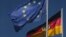 European, German flags at the chancellery, Berlin, Oct. 2012 (file photo).