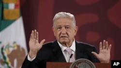 FILE- Mexico President Andres Manuel Lopez Obrador at his daily news conference in the National Palace in Mexico City, Friday, July 8, 2022.