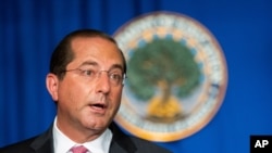 Menteri Kesehatan Amerika Alex Azar dalam konferensi pers mengenai perkembangan pandemi virus corona di Washington, 8 Juli 2020. 